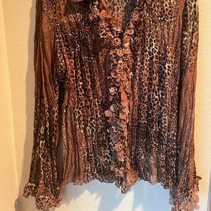 Claudia Richard’s beautiful and fun sheer animal print top